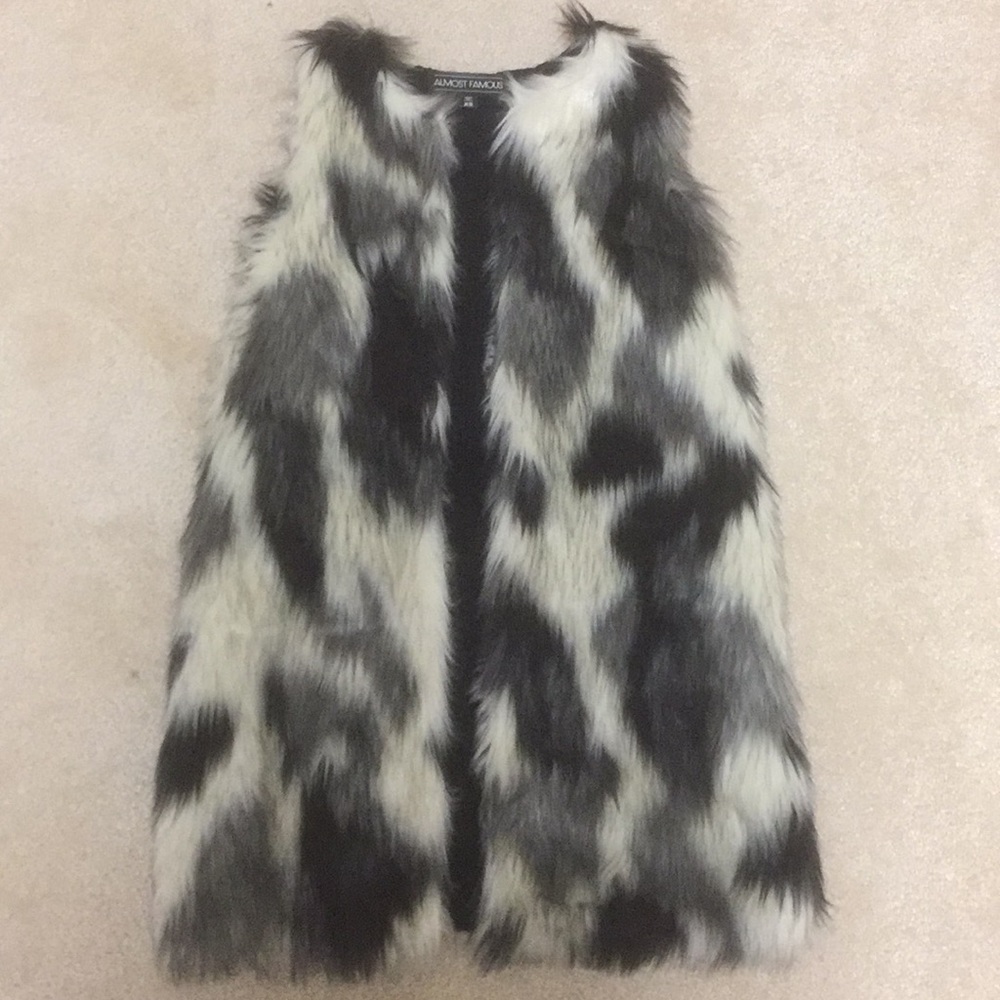 Black and grey fur vest